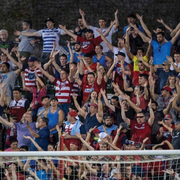 soccer fans behind the goal